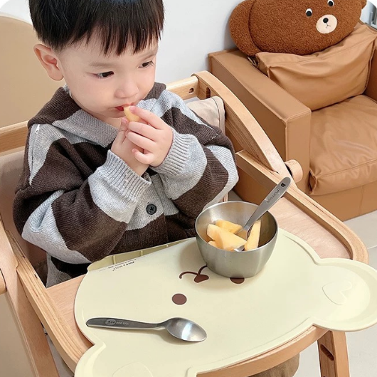 kids enjoying meal time with placemat