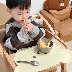 kids enjoying meal time with placemat